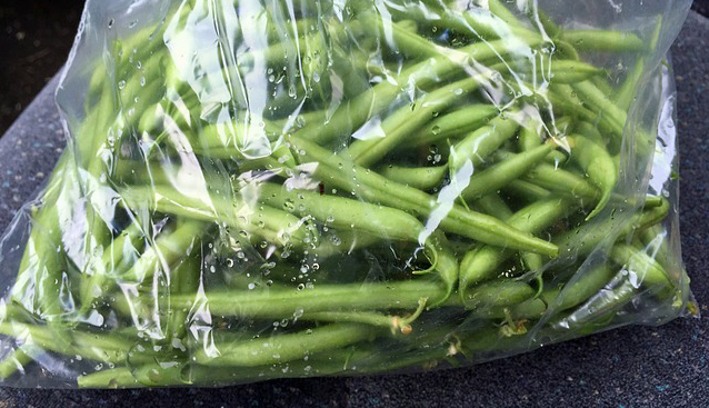 Fresh green beans in a plastic bag